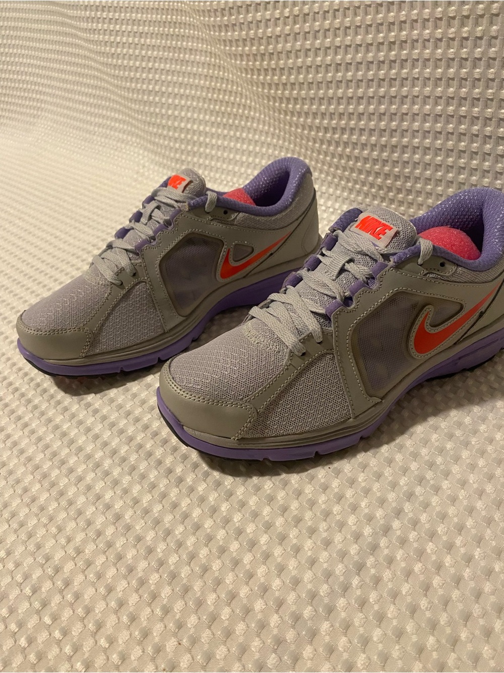 Nike Women’s Gray and Purple Dual Fusion Shoes.